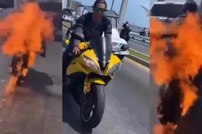 bike fire viral video  बीच सड़क पर चलती बाइक बनी आग का गोला 